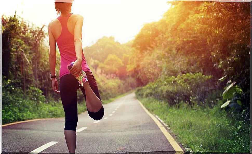 Woman stretching to relieve back pain