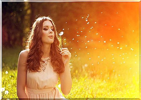 woman with dandelion