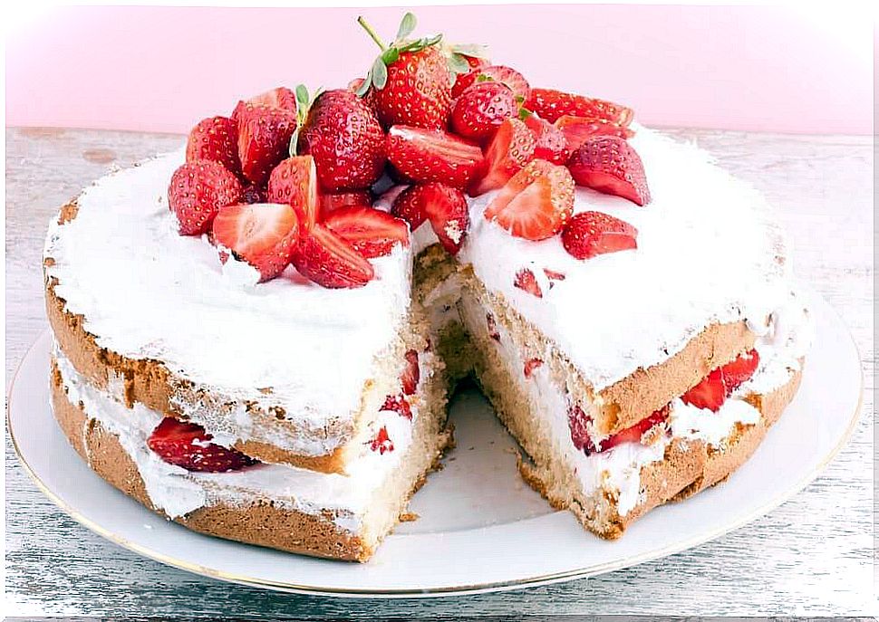 Delicious desserts: strawberry pie with cream