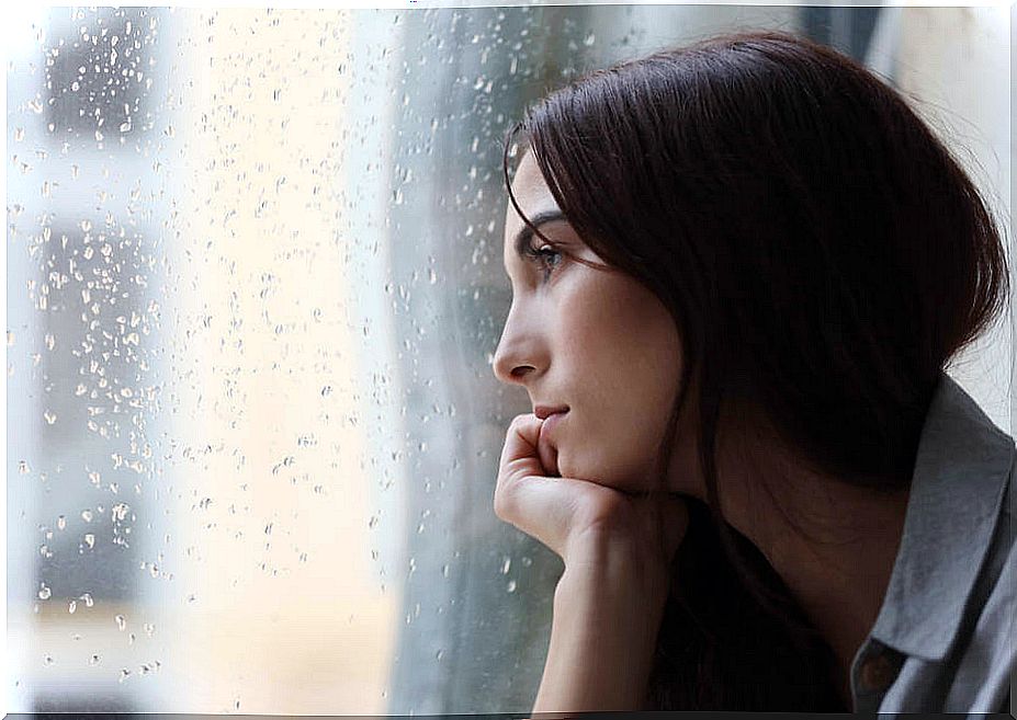 Woman facing the side effects of loneliness