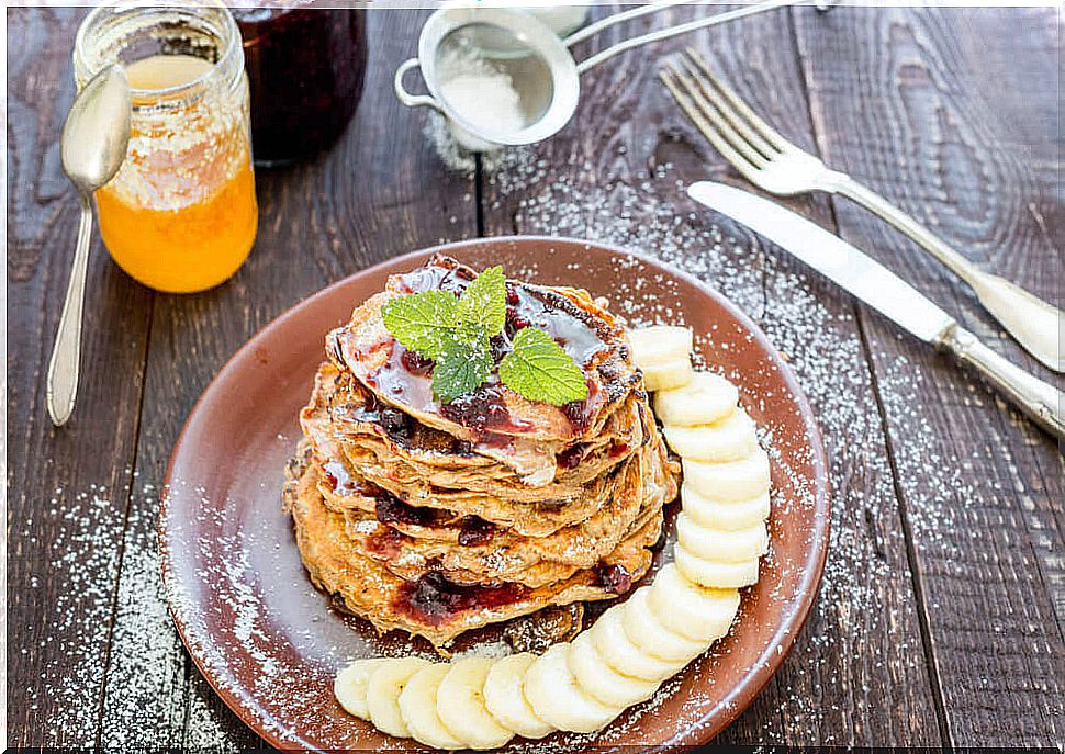 Healthy breakfast: oat, banana, cocoa and coconut oil pancakes